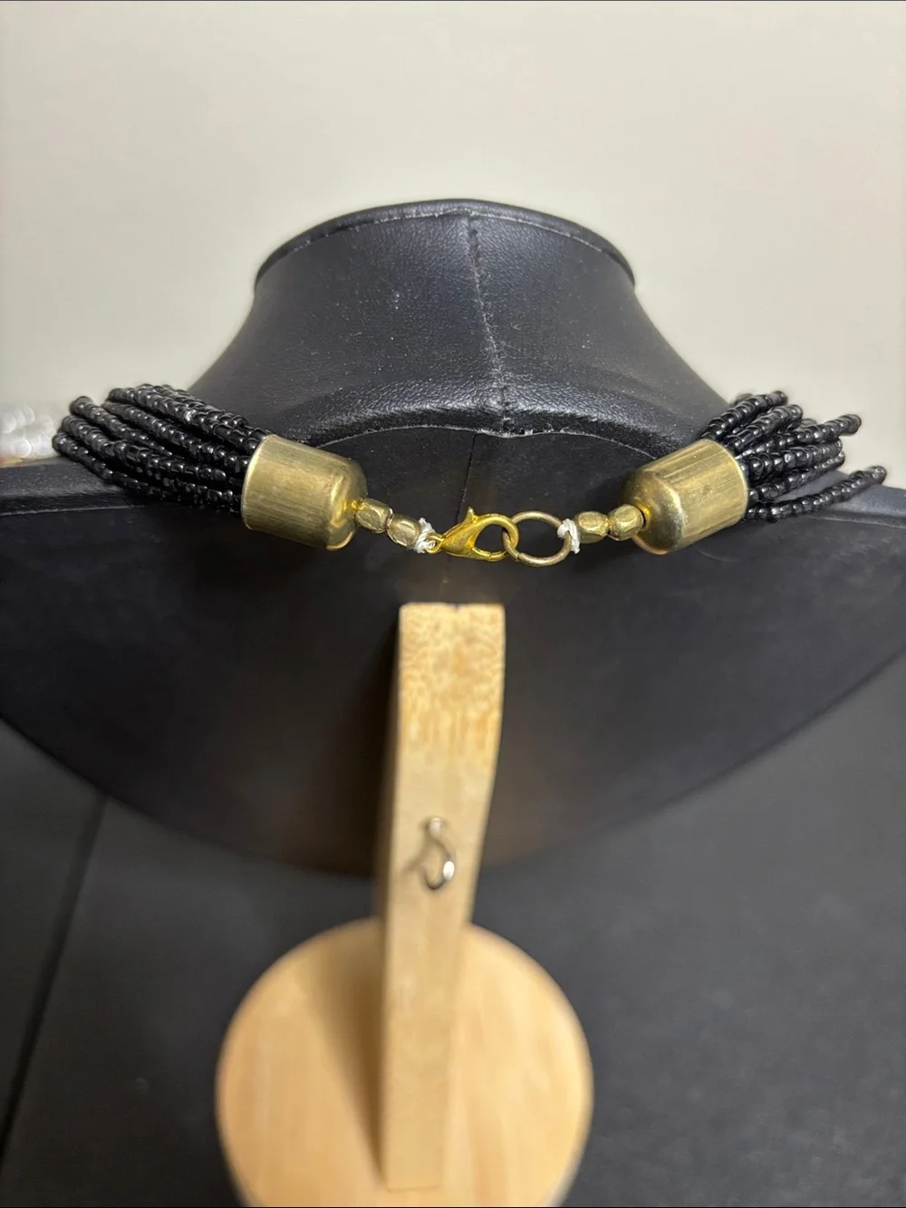 Black Glass Beaded Multi-Strand Necklace with Gold Tone  Curved Accent
